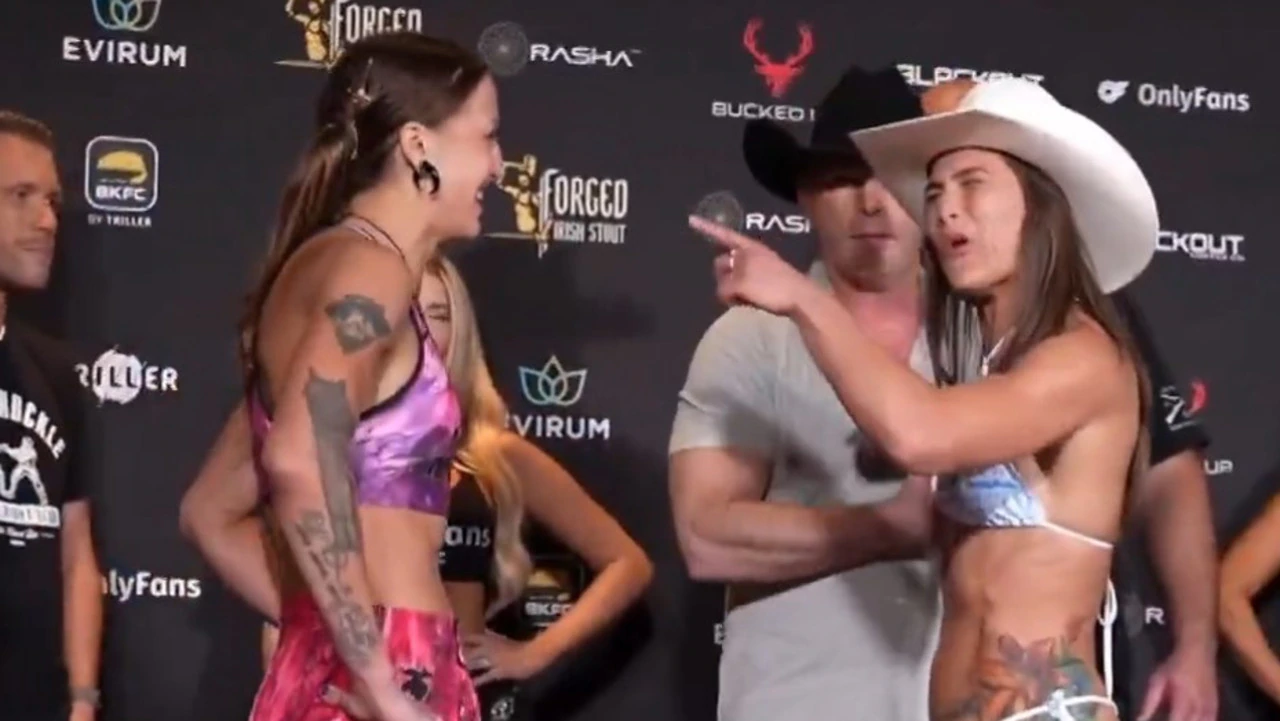 Bare-Knuckle Chaos: Fighter Stuns Crowd by Kissing Opponent During Face-Off! 5 245afb55720389adb6d18909bf96a740